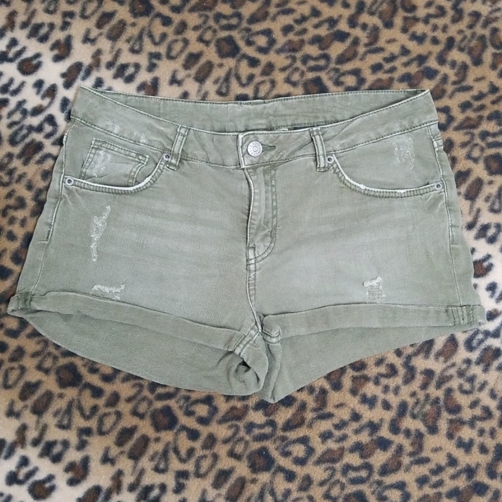 H&M distressed low rise, cuffed denim shirts